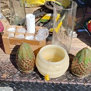 Cream Decorative Roll Candle Holder with Green Pinecone Accents